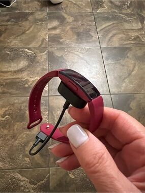 fitbit berry pink band with black display